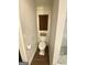 Cozy powder room with a toilet and window for natural light at 848 Still Rd, Lawrenceville, GA 30045