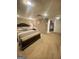 The comfortable bedroom features neutral colored walls, a bed, carpet, and a large clock at 848 Still Rd, Lawrenceville, GA 30045