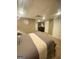 Bright and airy bedroom featuring carpet, a large bed, and decor at 848 Still Rd, Lawrenceville, GA 30045