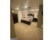 Cozy bedroom featuring a comfortable bed, dresser, and nightstands with lamps at 848 Still Rd, Lawrenceville, GA 30045