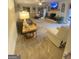 Inviting living room with plush carpet, fireplace, tv and plenty of comfortable seating at 848 Still Rd, Lawrenceville, GA 30045