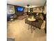 Cozy living room featuring a fireplace, flatscreen tv, and comfortable sectional sofa at 848 Still Rd, Lawrenceville, GA 30045