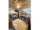 Well-lit, rustic-style office space with wooden ceiling, neutral rug, and plenty of storage and work space at 848 Still Rd, Lawrenceville, GA 30045