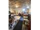 Office area featuring work stations, a painted wood ceiling, and a vintage industrial style at 848 Still Rd, Lawrenceville, GA 30045