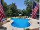 A large swimming pool is decorated for the summer holidays at 848 Still Rd, Lawrenceville, GA 30045