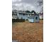 A spacious backyard with storage shed, and ample room for recreation and outdoor living at 5865 Vernier Dr, Atlanta, GA 30349