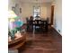 Dining room featuring hardwood floors, a dining table with seating for six at 5865 Vernier Dr, Atlanta, GA 30349