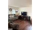 This is a warm and inviting living room with a gray sofa and a TV at 5865 Vernier Dr, Atlanta, GA 30349
