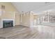 Cozy living room with a fireplace and access to the outside at 11789 Registry Blvd, Hampton, GA 30228