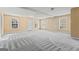 Spacious living room featuring lots of natural light and neutral walls at 11789 Registry Blvd, Hampton, GA 30228