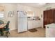 Bright kitchen with white cabinetry and a window overlooking the backyard at 143 Teamon Rd, Hampton, GA 30228