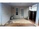 Patio featuring a concrete floor and access to the backyard at 165 Lakeside Pt, Covington, GA 30016