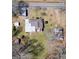 Aerial view of property including the main house and multiple outbuildings at 123 Cowan Rd, Covington, GA 30016