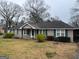Charming single-story residence with a covered carport and neat front yard at 123 Cowan Rd, Covington, GA 30016