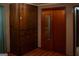 Main bedroom with wood flooring, built-in closet, and doorway to other rooms at 123 Cowan Rd, Covington, GA 30016