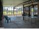 Bright sunroom with large windows, natural light, and a view of the outdoors at 123 Cowan Rd, Covington, GA 30016