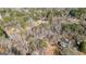 This home sits on a verdant wooded lot at 6255 James Rd, Austell, GA 30168