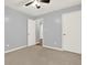Bedroom featuring light gray walls, carpet flooring, and white trim at 6255 James Rd, Austell, GA 30168