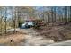 Scenic view of a home featuring a long driveway at 6255 James Rd, Austell, GA 30168