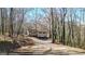 Distant view of the house down a long driveway at 6255 James Rd, Austell, GA 30168