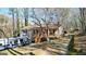 Charming exterior showcasing a cozy porch and well-kept landscaping at 6255 James Rd, Austell, GA 30168