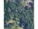 The home's location is shown via an aerial map displaying a plot on a well vegetated lot at 6255 James Rd, Austell, GA 30168