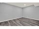 The living room features gray-toned walls and gray wood-look flooring at 6255 James Rd, Austell, GA 30168