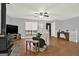 Bright and airy living room has hardwood floors and updated fixtures throughout at 6255 James Rd, Austell, GA 30168