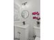 Elegant bathroom with a stylish vanity, round mirror, and modern fixtures at 2378 Green Forrest Dr, Decatur, GA 30032