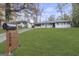 Inviting home exterior with lush lawn, mailbox, and visible house number at 2378 Green Forrest Dr, Decatur, GA 30032