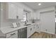 Modern kitchen featuring white cabinets, subway tile backsplash, and stainless appliances at 2378 Green Forrest Dr, Decatur, GA 30032