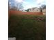 Fenced backyard offering privacy and room for gardening or recreation at 6160 Great Oaks Dr, Lithonia, GA 30058