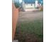 Spacious backyard featuring a wooden fence and lush green grass at 6160 Great Oaks Dr, Lithonia, GA 30058
