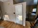 Hallway with hardwood floors and a closet at 6160 Great Oaks Dr, Lithonia, GA 30058