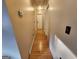 Hallway with hardwood floors and light-colored walls at 6160 Great Oaks Dr, Lithonia, GA 30058