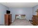 Comfortable bedroom with TV and cozy decor at 275 Bramble Bush Trl, Covington, GA 30014