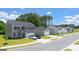 Street view showing new construction homes with well-maintained lawns and driveways, defining a modern neighborhood at 8595 Secretariat Dr # 19, Lithonia, GA 30058