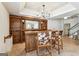 Entertainment space featuring a bar with decorative chairs and a mirrored backdrop at 4569 Chatsworth Ovrlk Ne, Roswell, GA 30075