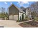 Lovely home featuring a 2-car garage and a well-maintained landscape at 4569 Chatsworth Ovrlk Ne, Roswell, GA 30075