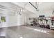 Spacious two-car garage featuring epoxy flooring and plenty of storage space at 4569 Chatsworth Ovrlk Ne, Roswell, GA 30075