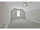 Bedroom featuring neutral carpet and ceiling fan and single window at 12241 Crestwood Ct, Fayetteville, GA 30215