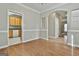 Dining room shows hardwood floors, leading into the kitchen at 12241 Crestwood Ct, Fayetteville, GA 30215