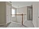 Bright hallway with decorative chandelier at 12241 Crestwood Ct, Fayetteville, GA 30215