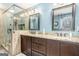 Primary bathroom with double sink vanity, granite countertops and glass shower at 149 Crown Oaks Dr, Stockbridge, GA 30281