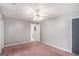 Neutral bedroom with gray walls featuring standard closet and ceiling fan at 149 Crown Oaks Dr, Stockbridge, GA 30281