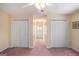 Bedroom featuring multiple closets, ceiling fan and natural light at 149 Crown Oaks Dr, Stockbridge, GA 30281