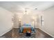 Comfortable bedroom with a ceiling fan, hardwood floors, and a neutral color palette at 149 Crown Oaks Dr, Stockbridge, GA 30281