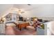 Spacious bonus room area with TV, games, bed and vaulted ceilings at 149 Crown Oaks Dr, Stockbridge, GA 30281