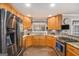 This beautiful kitchen features stainless steel appliances and granite countertops at 149 Crown Oaks Dr, Stockbridge, GA 30281
