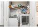 Bright laundry room featuring shelving and modern Samsung washer and dryer at 149 Crown Oaks Dr, Stockbridge, GA 30281